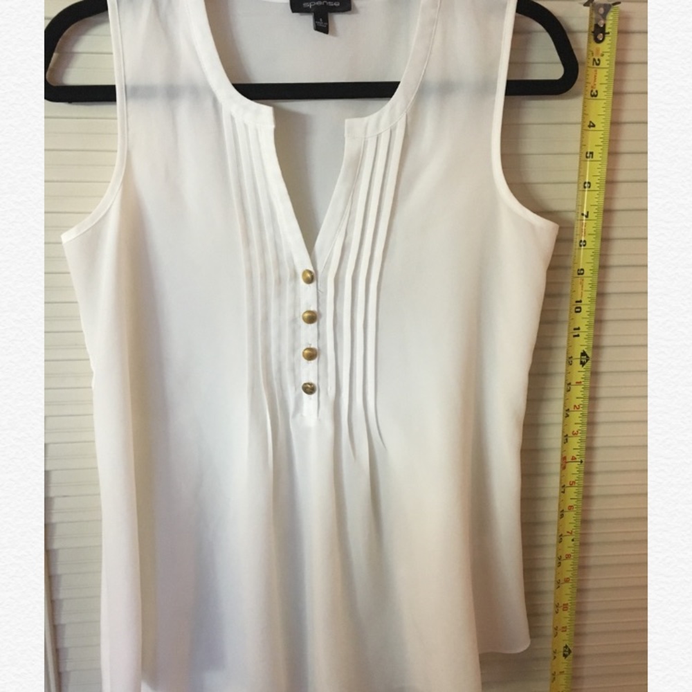 White sleeveless blouse
